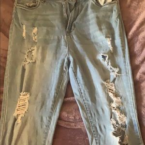 High waisted, touches the ankle jeans.